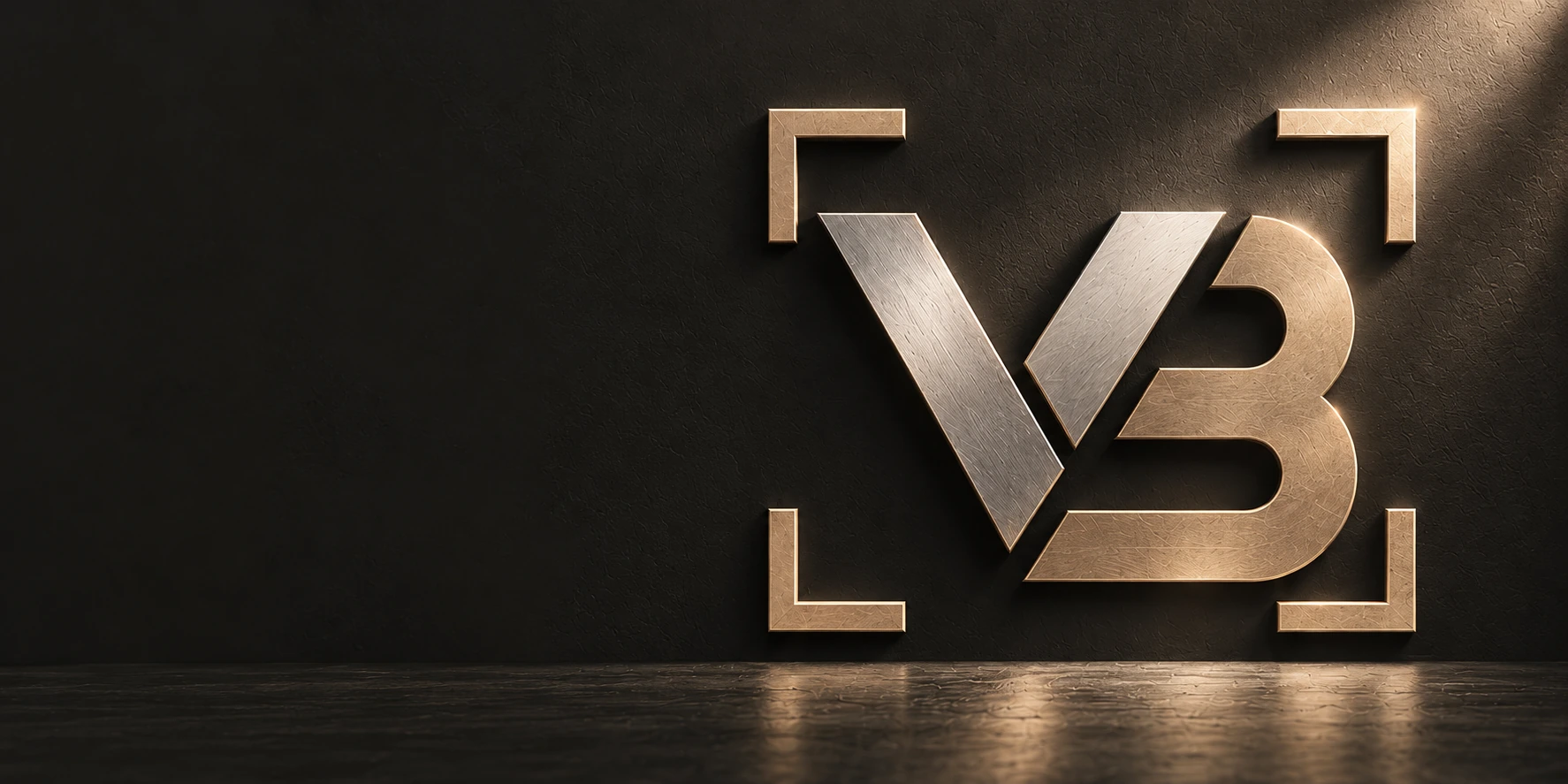 The Van Breda monogram in brushed silver and bronze on warm charcoal
